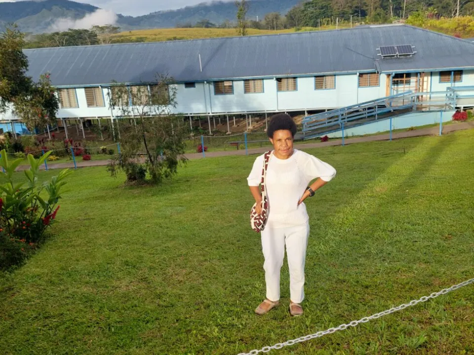 Lalu-Pepna-in-front-of-Kassam-Rural-Hospital-Obura-Wonenara-Eastern-Highlands-Province